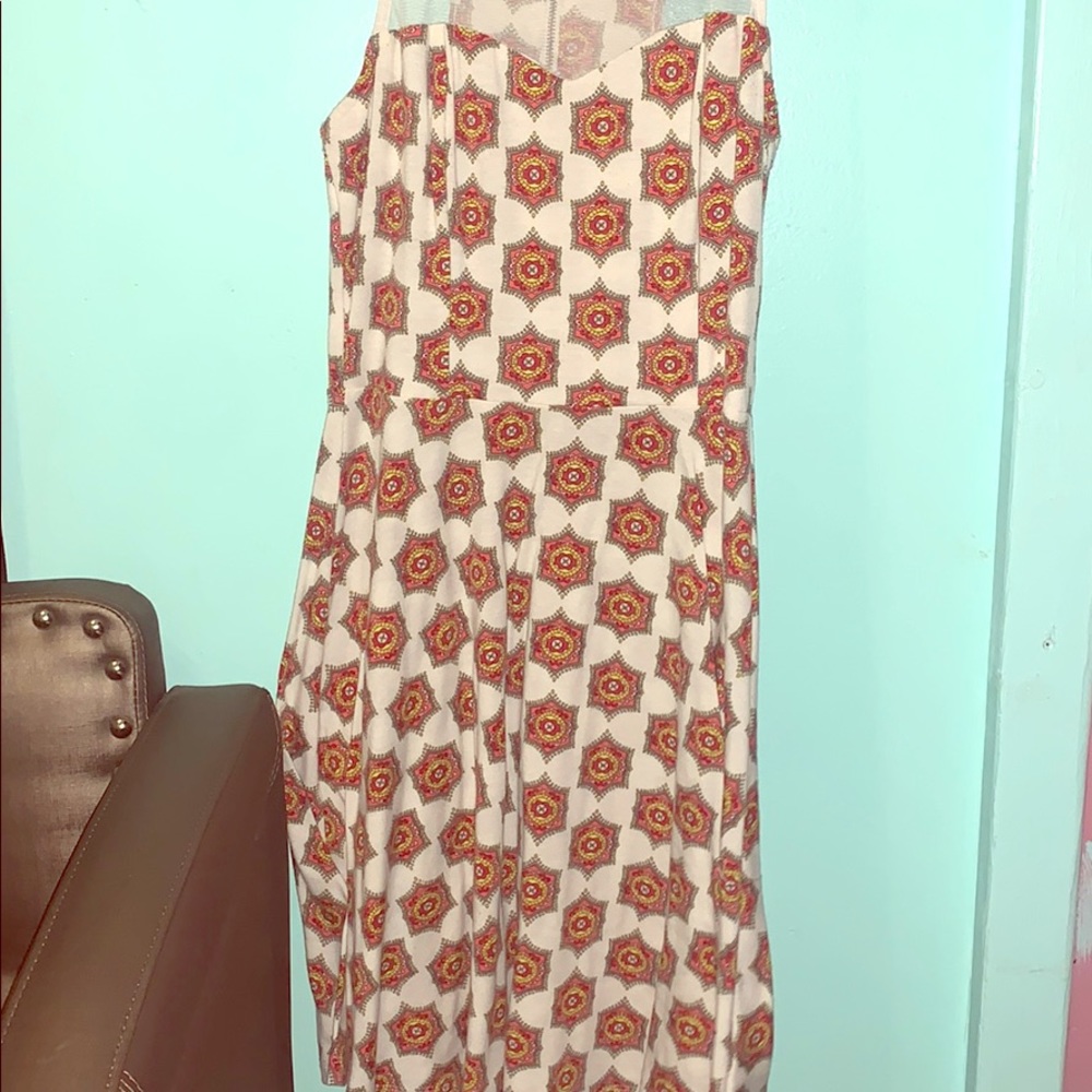 A beige dress with pretty design